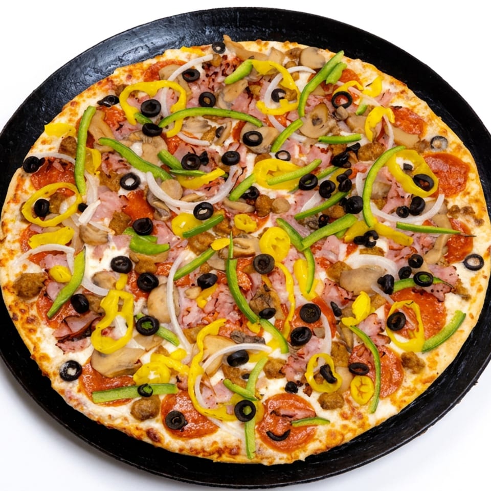 Loaded pizza topped with pepperoni, ham, mushrooms, black olives, green peppers, onions, and banana peppers on a black serving tray.